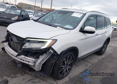 2021 Honda Pilot 2Wd Touring 8 Passenger z USA, uszkodzony, nr VIN 5FNYF5H91MB010304